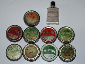 A collection of vintage line dressing tins